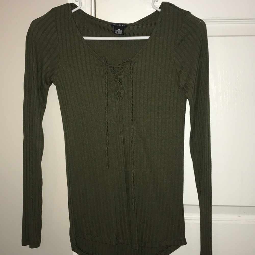 green crisscross shirt